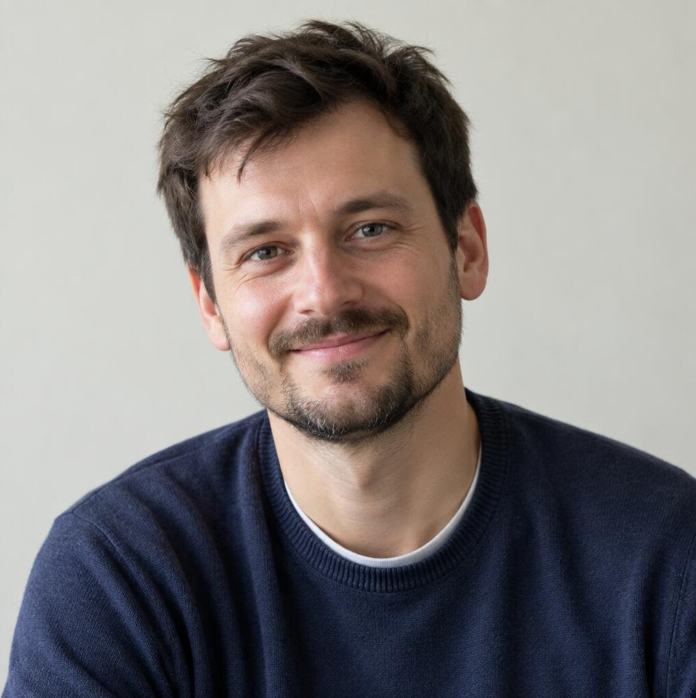 Casual portrait of a smiling Czech man alumnus